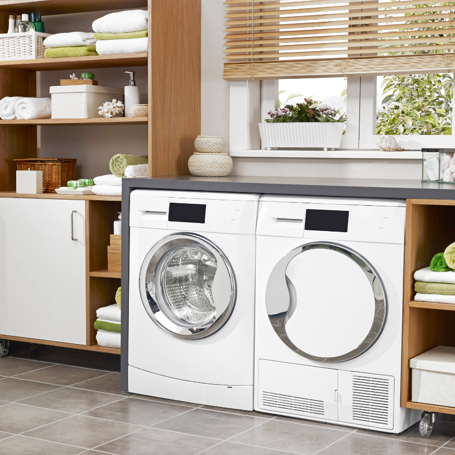 Interior of a room with a washing machine and a clothes dryer